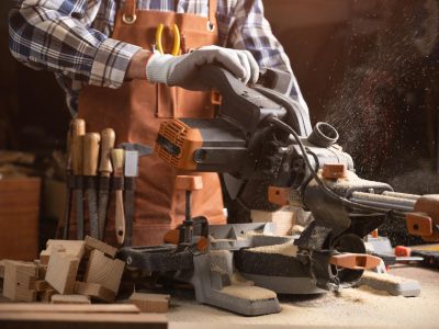 Carpenter Working At Workshop. High quality photo